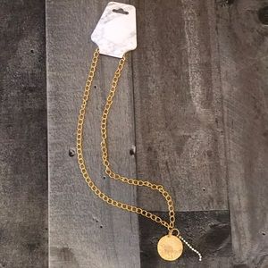 Gold tone chain coin pendant necklace